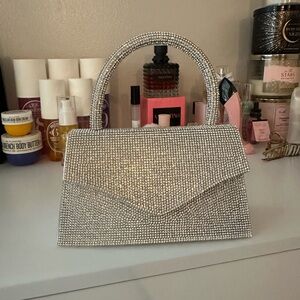 Steve Madden Rhinestone mini trapezoid handbag has only been used once.